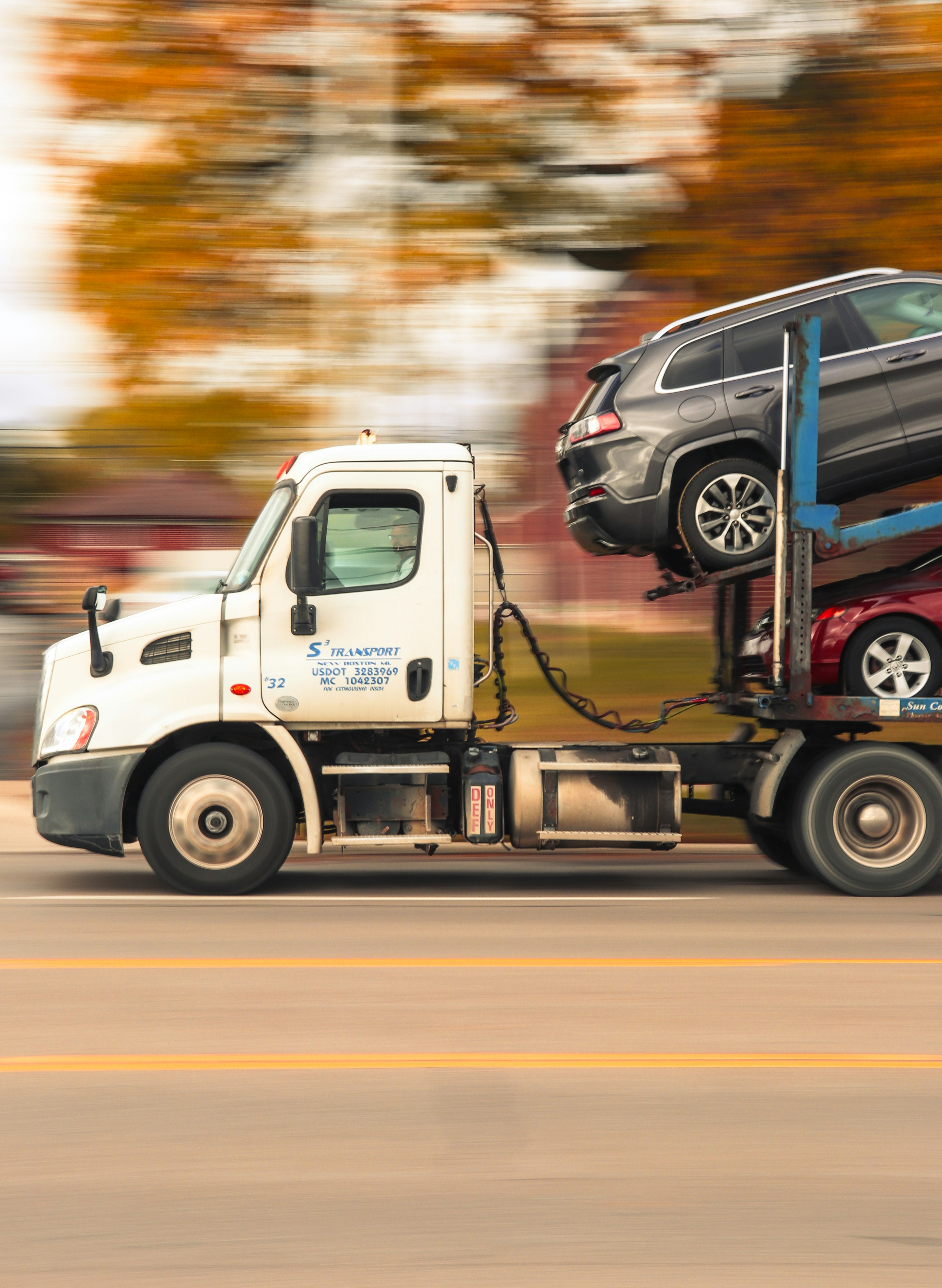 Vehicle transporter at a Vezolo Logistics partner yard